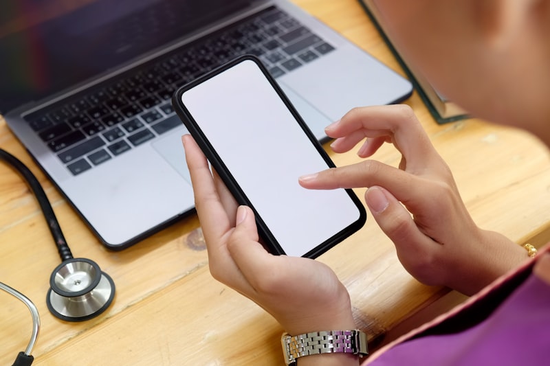 Nurse using mobile device